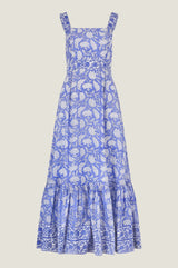 A sleeveless, square-neck, blue and white floral print maxi dress with a fitted bodice, flared skirt, and ruffled hem.