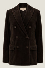 Additional styled photo of a model wearing the Aspiga Double Breasted Corduroy Blazer in Chocolate Brown, a tailored corduroy blazer with a peak lapel and double-breasted button front