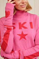 Merino Wool Ski Star Motif Slim Polo Neck Jumper | Pink/Red