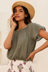 Khaki Ilana cotton short sleeve top with shirred neckline and elasticated neckline and hem styled with Aspiga antique block print cream skirt and panama hat