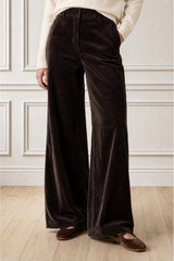 Model wearing the Aspiga Wide Leg Chunky Corduroy Trouser in Chocolate Brown, a high-waisted wide-leg corduroy trouser with patch pockets, front view