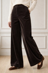 Model wearing the Aspiga Wide Leg Chunky Corduroy Trouser in Chocolate Brown, a high-waisted wide-leg corduroy trouser with patch pockets, alternate view
