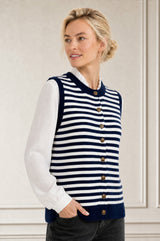 Model wearing the Aspiga Merino Wool Stripe Button Knit Gilet in Navy/Off White, a breton-striped button-front knit gilet, alternate view