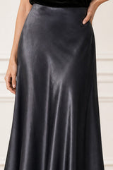 Close-up of the satin texture of the Aspiga Satin Slip Skirt in Slate