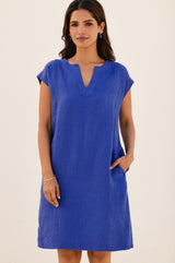 Dori Linen mini dress in cobalt blue with capped sleeves, concealed side pockets with a small v-neck